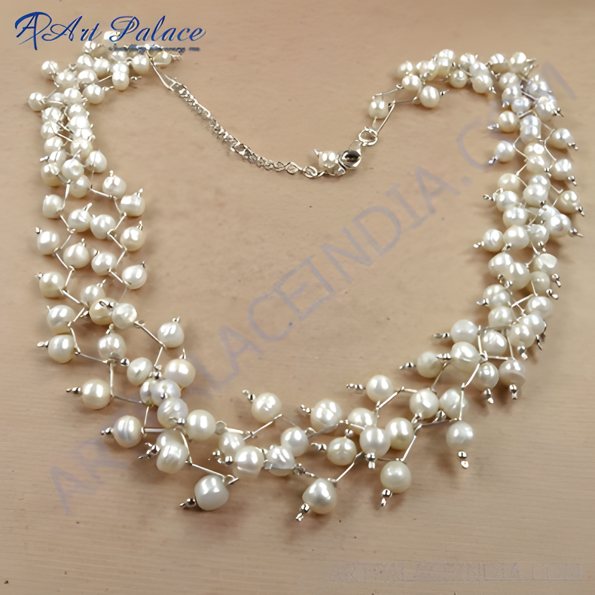 Sterling silver pearl cluster necklace featuring freshwater pearls and a delicate silver chain design
