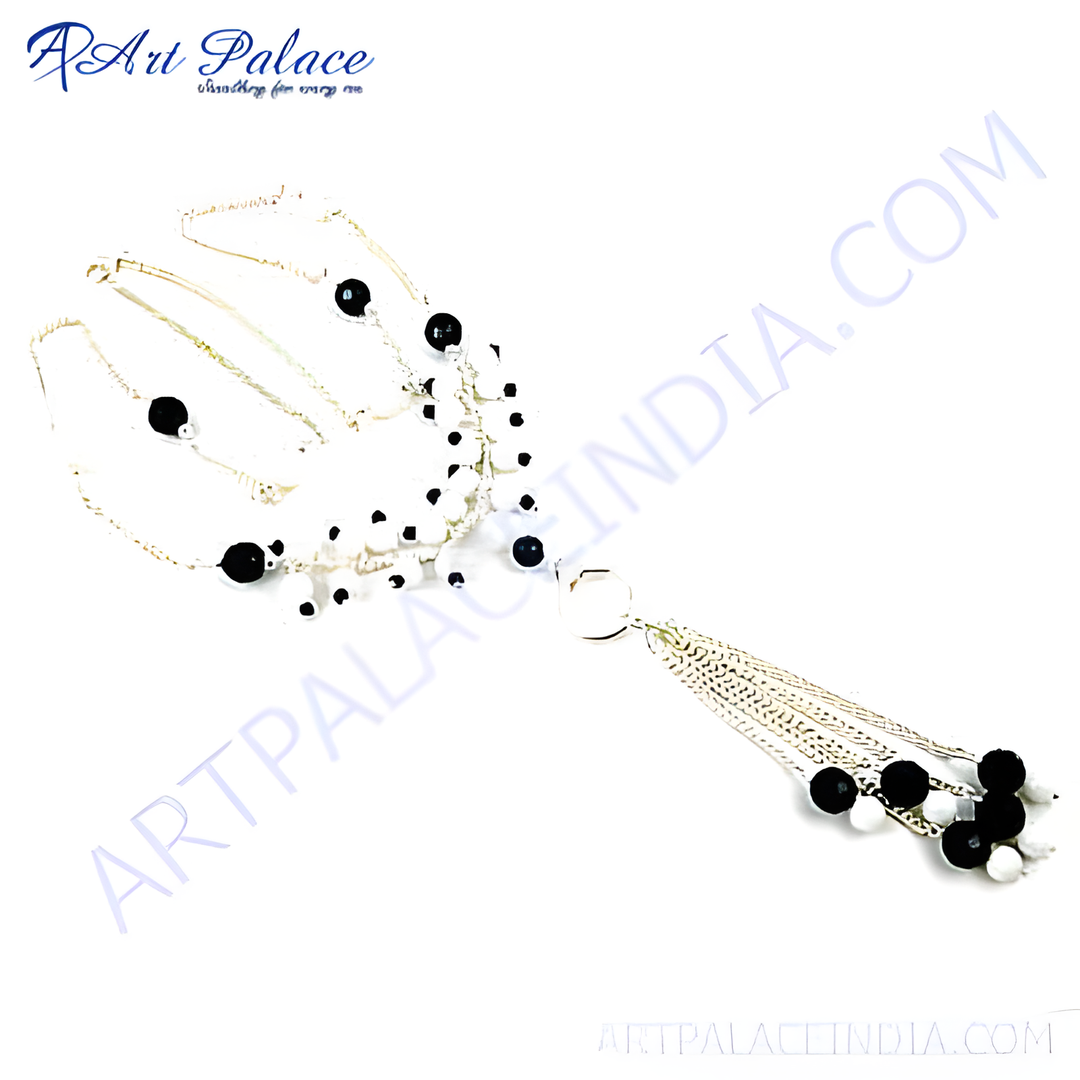 Silver beaded pendant necklace featuring black and white beads, perfect for women's fashion jewelry.