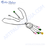 Load image into Gallery viewer, Silver pendant necklace with a circular design and colorful gemstone accents on a white background.
