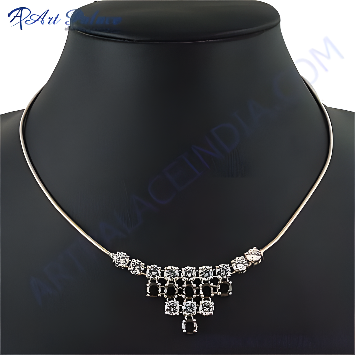 Silver necklace with sparkling cubic zirconia stones on a black mannequin, perfect for women's jewelry