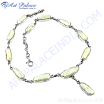 Load image into Gallery viewer, Sterling silver necklace with long, irregular shaped freshwater pearls set in silver. White background.
