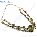 Load image into Gallery viewer, Sterling silver pearl necklace with brown and yellow oval pearls and a central oval gemstone
