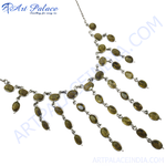 Load image into Gallery viewer, Sterling silver statement necklace with olive green gemstones on a white background.
