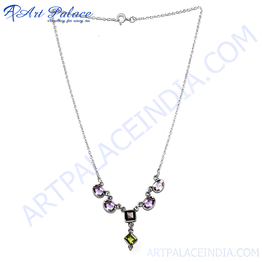 Sterling silver necklace with amethyst and peridot gemstones in a pendant design.