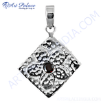 Load image into Gallery viewer, 925 sterling silver hammered pendant with a round red garnet gemstone center
