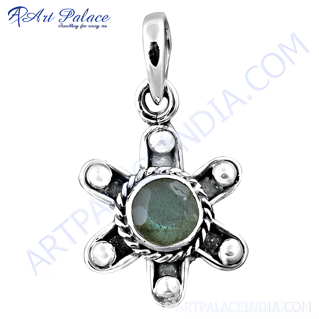 Sterling silver flower pendant with a central green labradorite gemstone and accents.