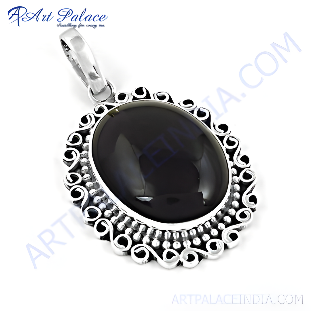 925 sterling silver pendant with a black oval onyx gemstone center, ornate design.