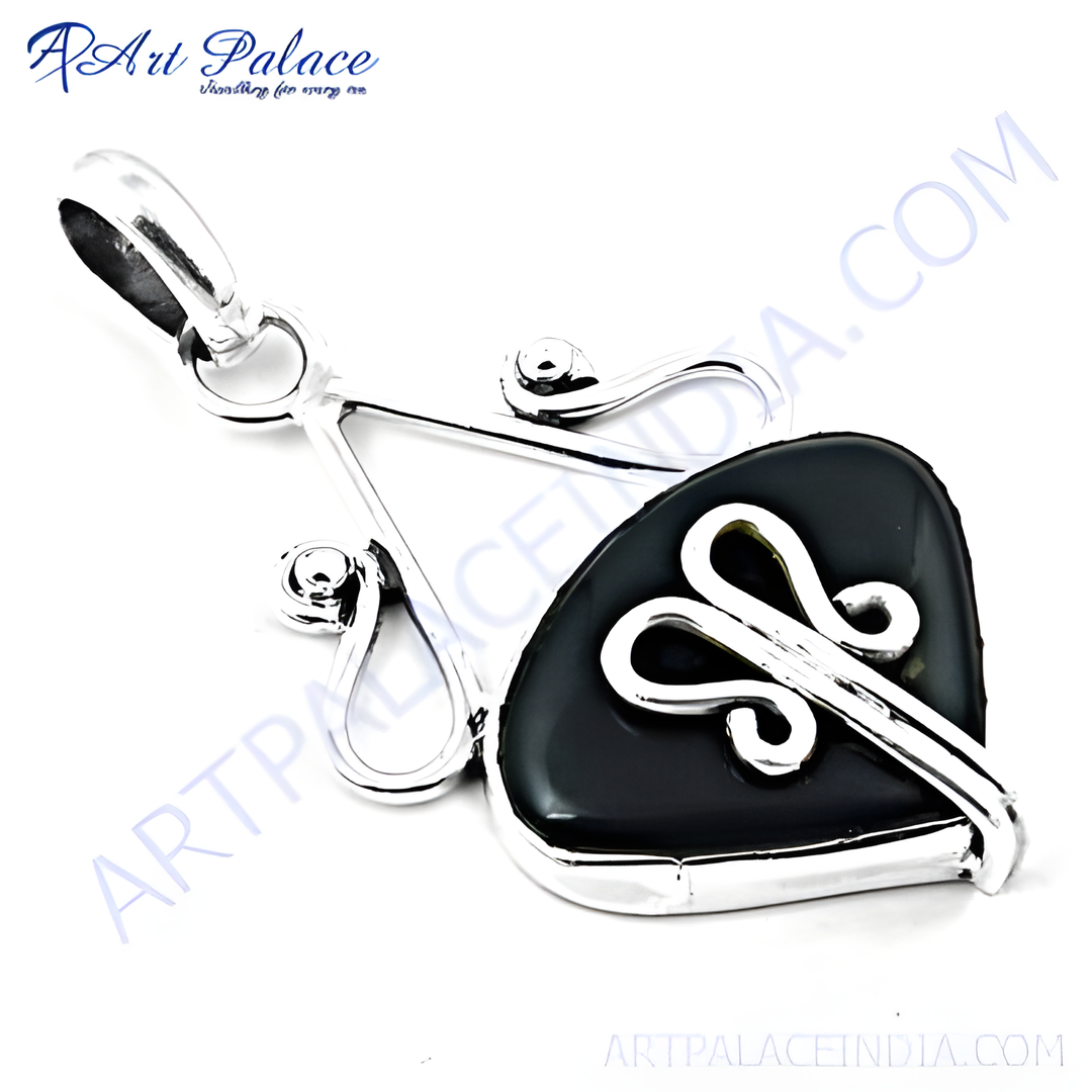 Sterling silver pendant with a black onyx gemstone. A modern and elegant necklace design.