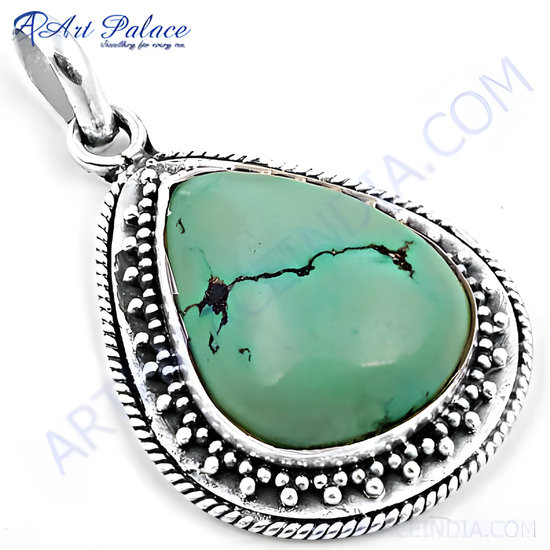 Sterling silver turquoise pendant, featuring a pear-shaped green turquoise gemstone. Elegant design for women.