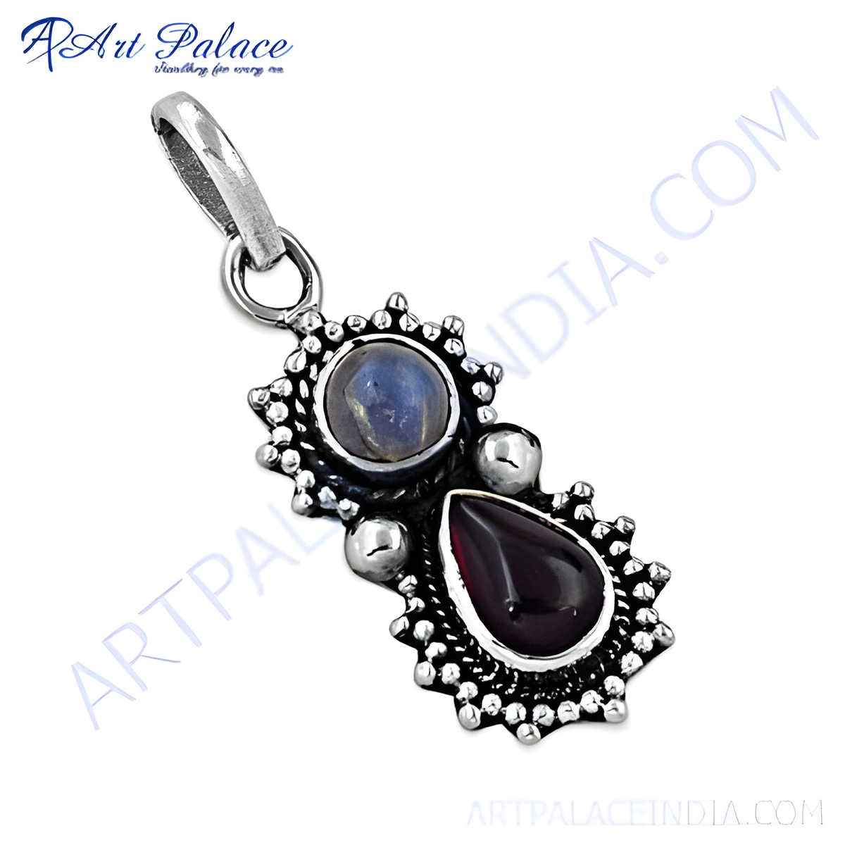 Sterling silver pendant featuring a garnet and moonstone gemstone