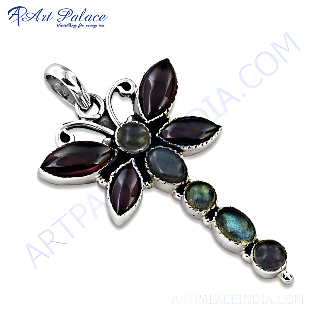 Sterling silver dragonfly pendant with garnet and labradorite gemstones, a colorful and unique jewelry piece.