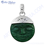 Load image into Gallery viewer, Sterling silver pendant with carved green jade face. A unique, artistic jewelry piece.
