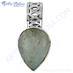 Load image into Gallery viewer, Sterling silver teardrop pendant with a shimmering labradorite gemstone, perfect for women.
