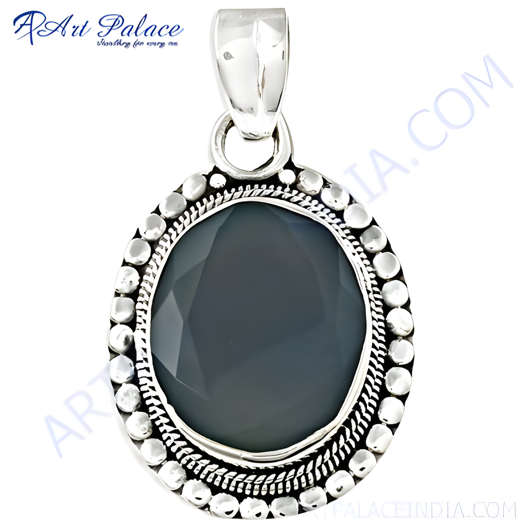 925 sterling silver oval chalcedony pendant with a faceted gray gemstone.