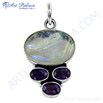 Load image into Gallery viewer, 925 sterling silver pendant featuring a large oval moonstone and three amethyst gemstones.
