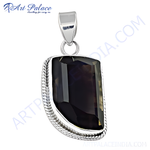 Load image into Gallery viewer, Sterling silver pendant with a faceted smoky quartz gemstone. A dark, translucent stone in a silver setting.
