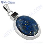 Load image into Gallery viewer, Sterling silver pendant featuring an oval lapis lazuli gemstone in a silver setting.
