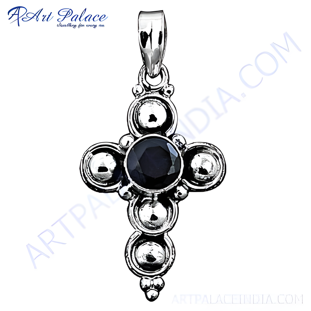 Sterling silver cross pendant with a black gemstone center. A religious and elegant charm for everyday wear.