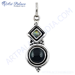 Load image into Gallery viewer, Sterling silver black onyx pendant with a round black gemstone and a square setting, a stylish accessory.
