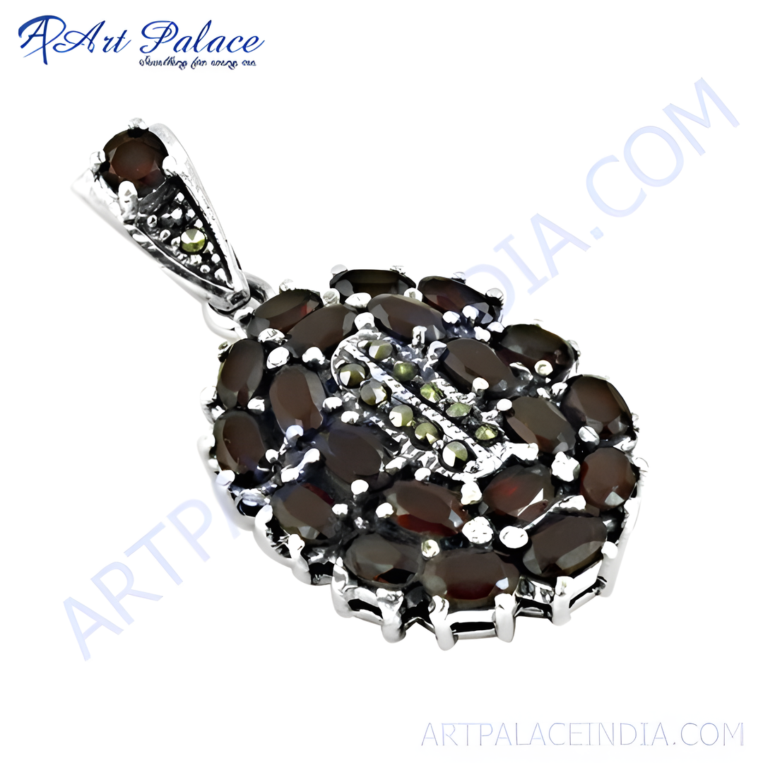 925 sterling silver garnet pendant with oval-cut red gemstones and marcasite detailing