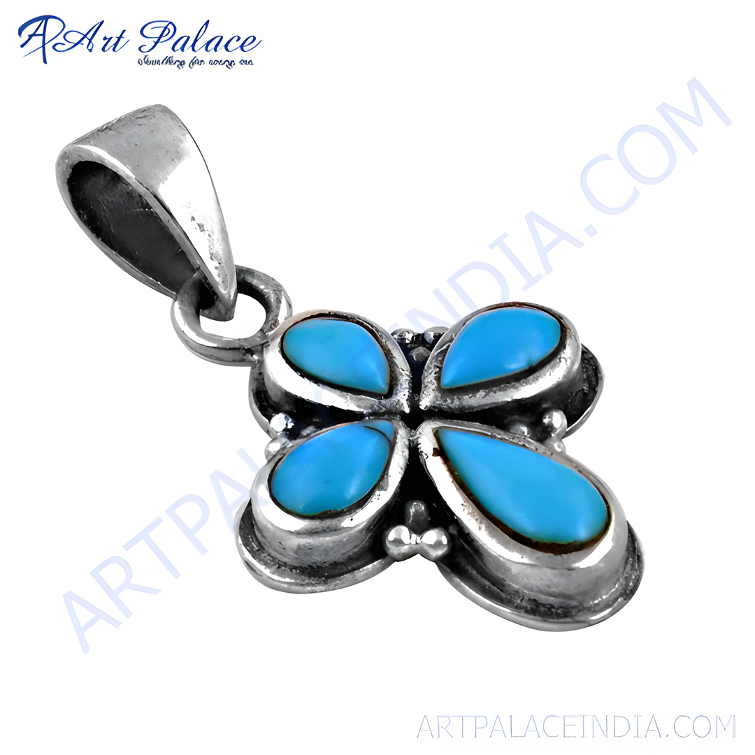 925 sterling silver flower pendant with four turquoise gemstone petals.