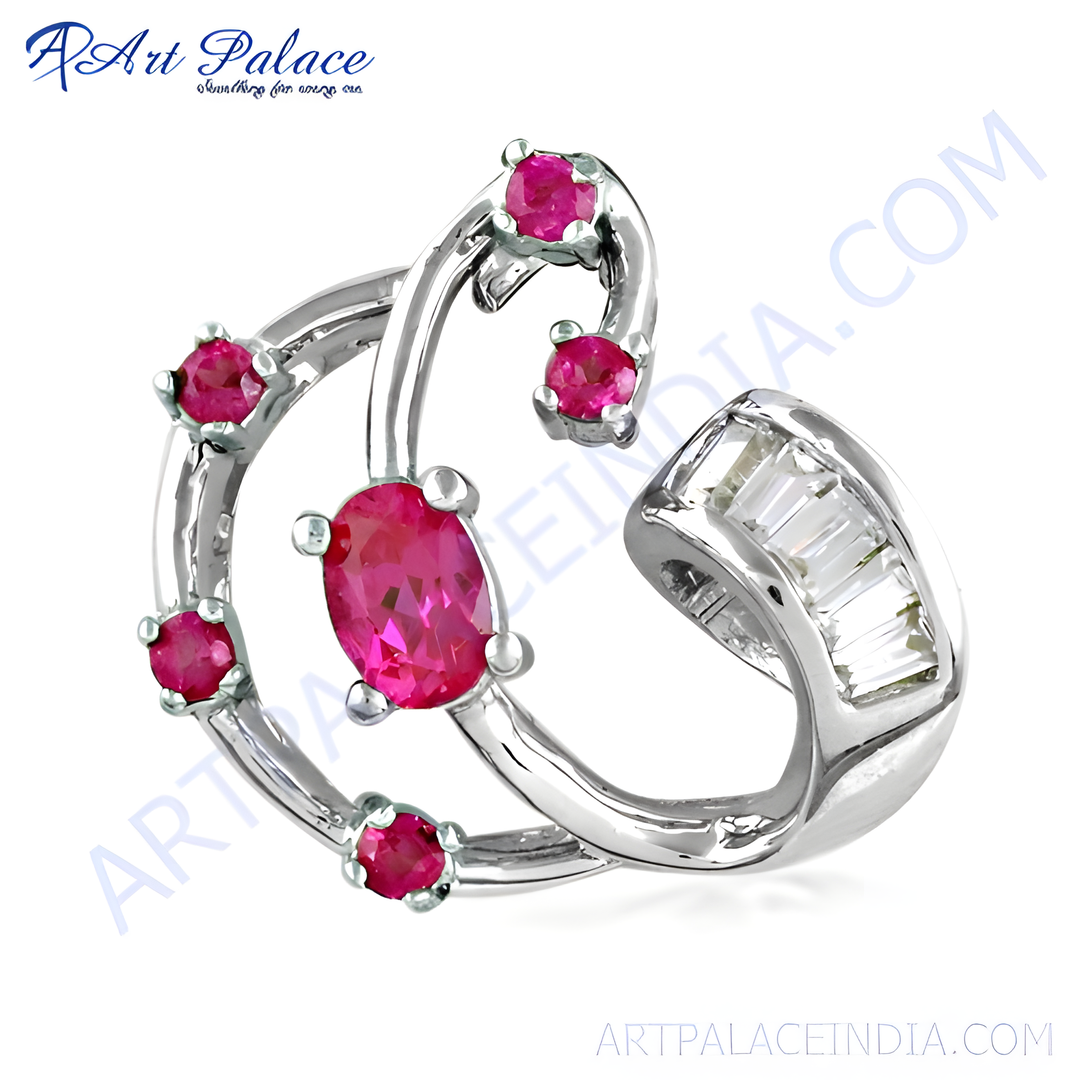 Sterling silver ring with vibrant pink ruby gemstones. Modern and stylish design.