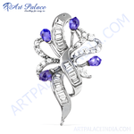 Load image into Gallery viewer, Silver brooch with tanzanite and diamond gemstones, a unique and elegant jewelry design.

