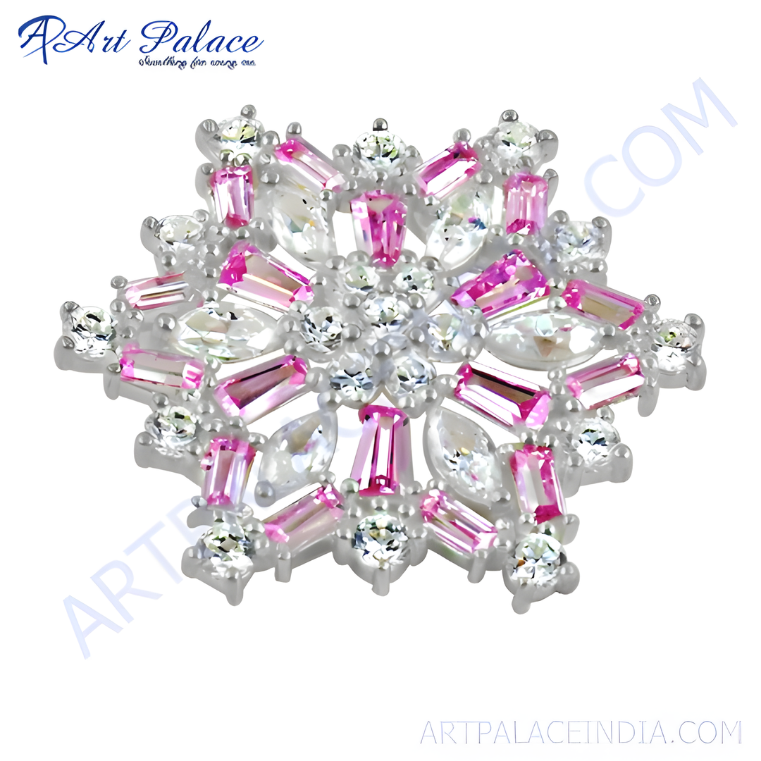 Silver snowflake brooch with pink and white gemstones, perfect for women. A beautiful and elegant accessory for any occasion.