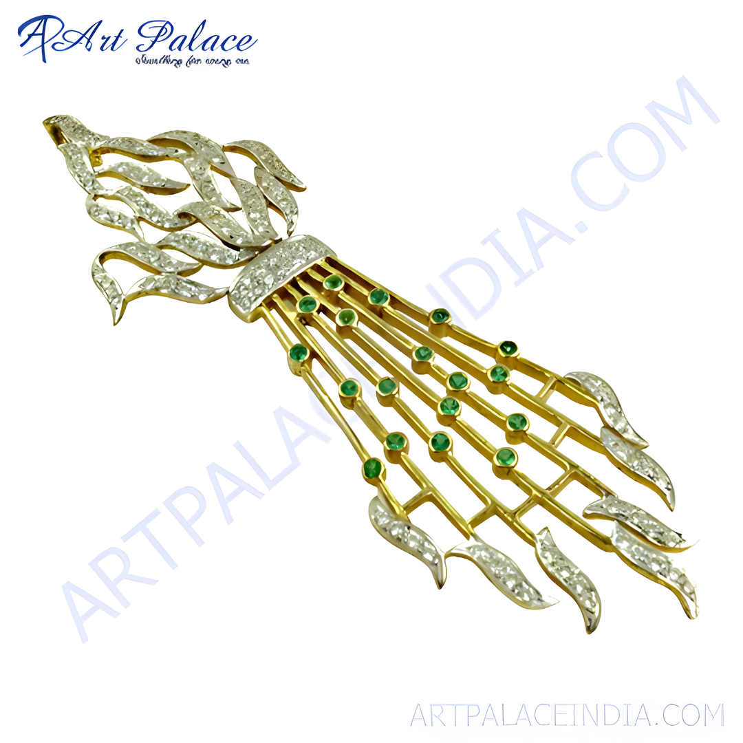gold plating brooch featuring emeralds and diamonds.
