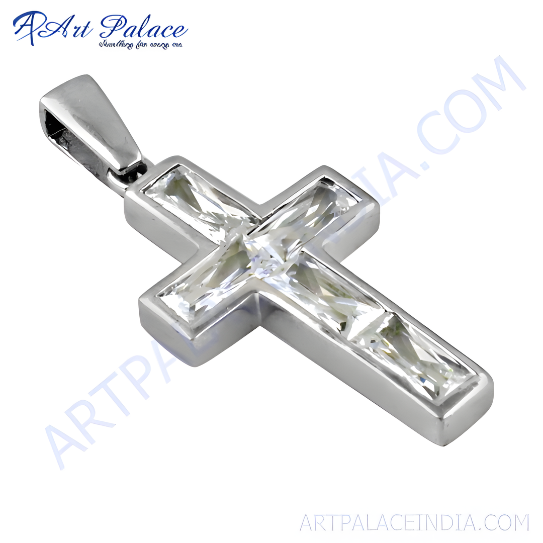 Sterling silver cross pendant with baguette-cut clear cubic zirconia stones.