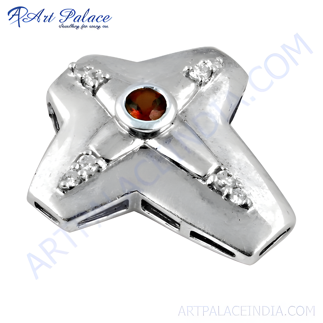 925 sterling silver cross pendant with a round garnet gemstone center and sparkling cubic zirconia accents.