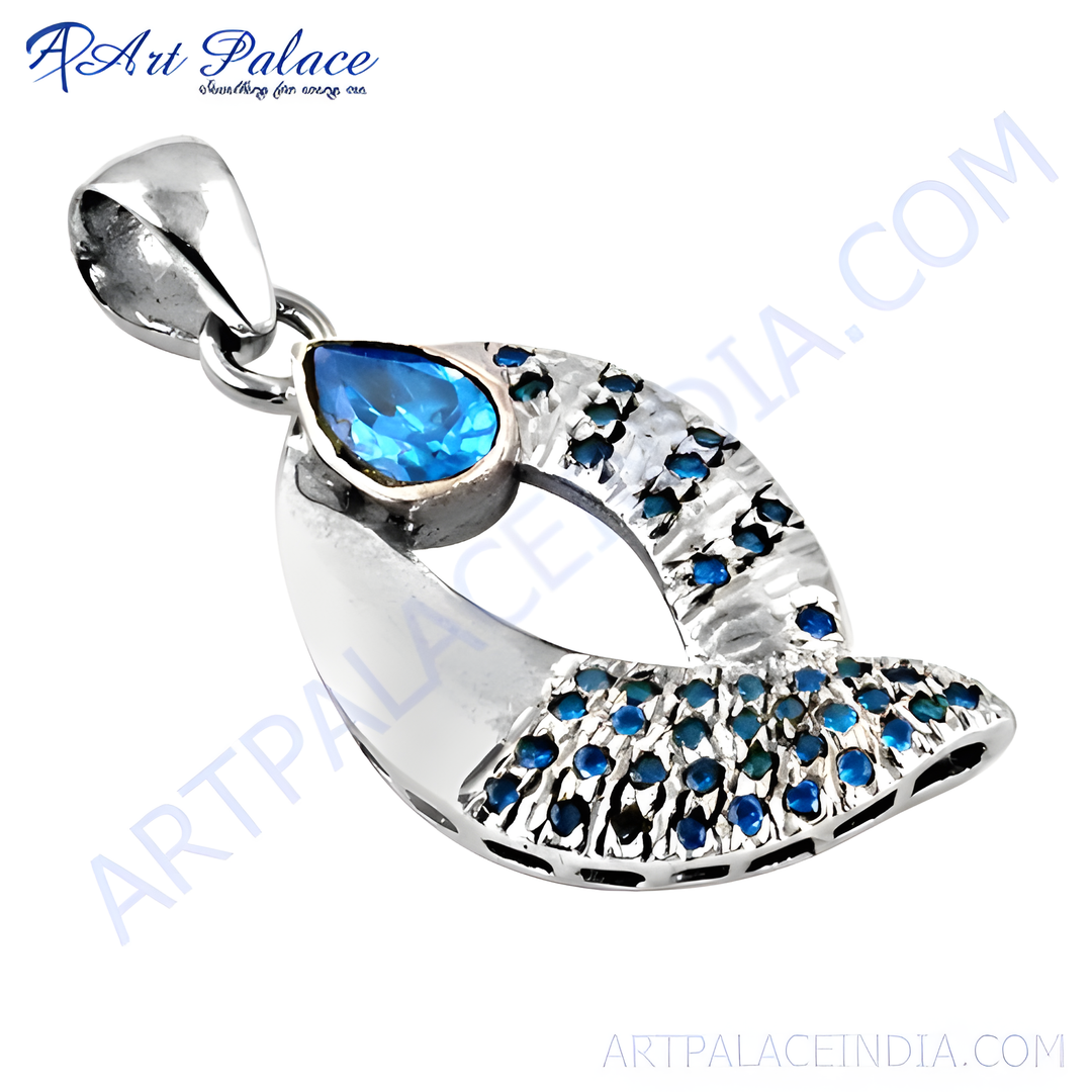 925 sterling silver pendant with a pear-shaped blue gemstone and accents.