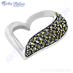 Load image into Gallery viewer, Sterling silver heart pendant with green gemstones, a beautiful and elegant piece of jewelry.
