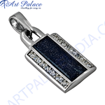 Load image into Gallery viewer, Silver pendant necklace with a blue sandstone center stone and sparkling cubic zirconia accents.
