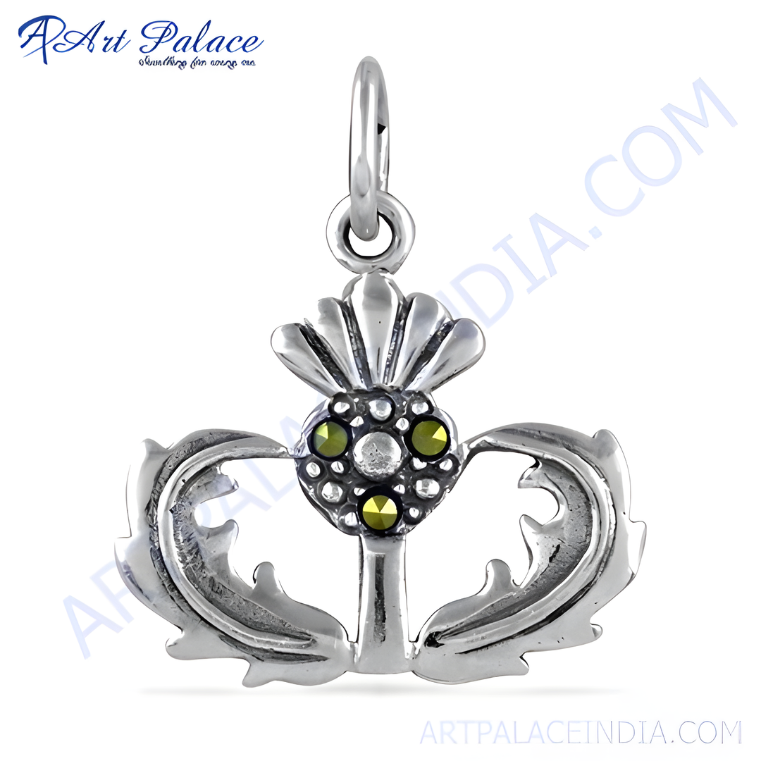 Sterling silver thistle pendant with green gemstone accents, Scottish jewelry design.