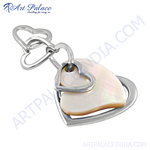 Load image into Gallery viewer, Silver heart charm pendant with mother of pearl center and elegant design.
