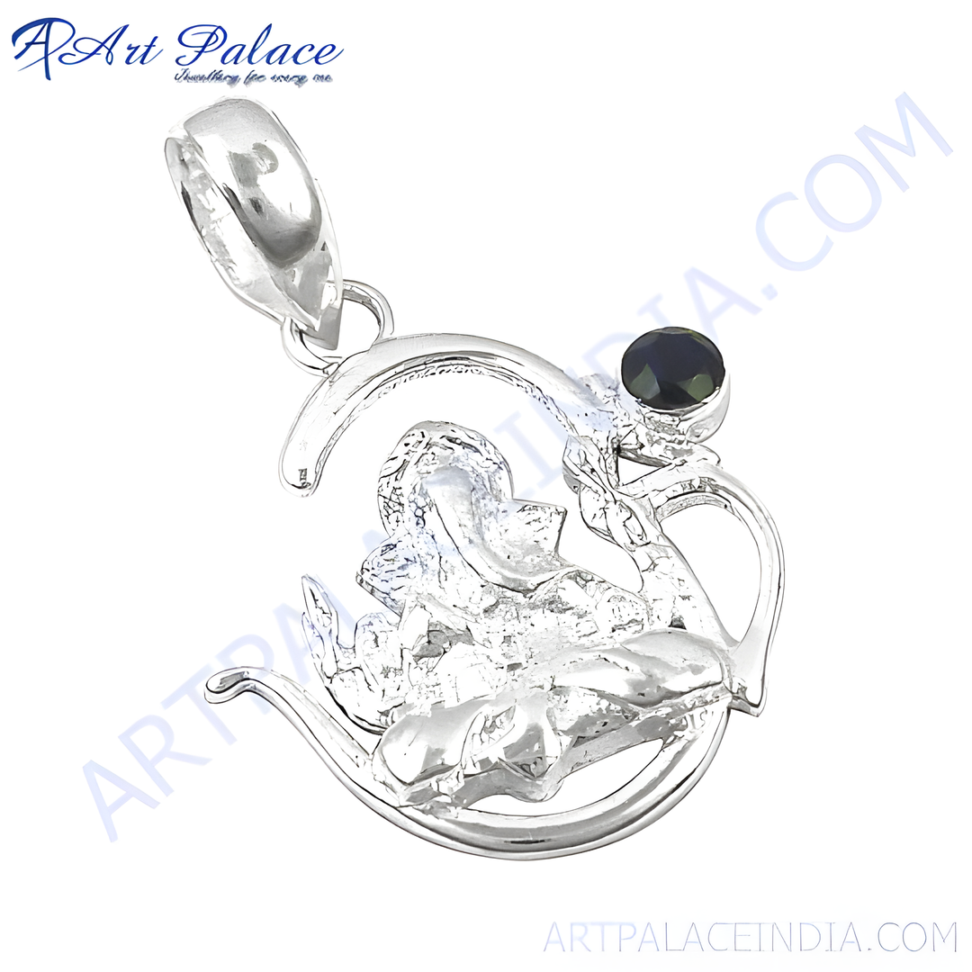 Sterling silver Ganesha pendant with an emerald gemstone, perfect for women.