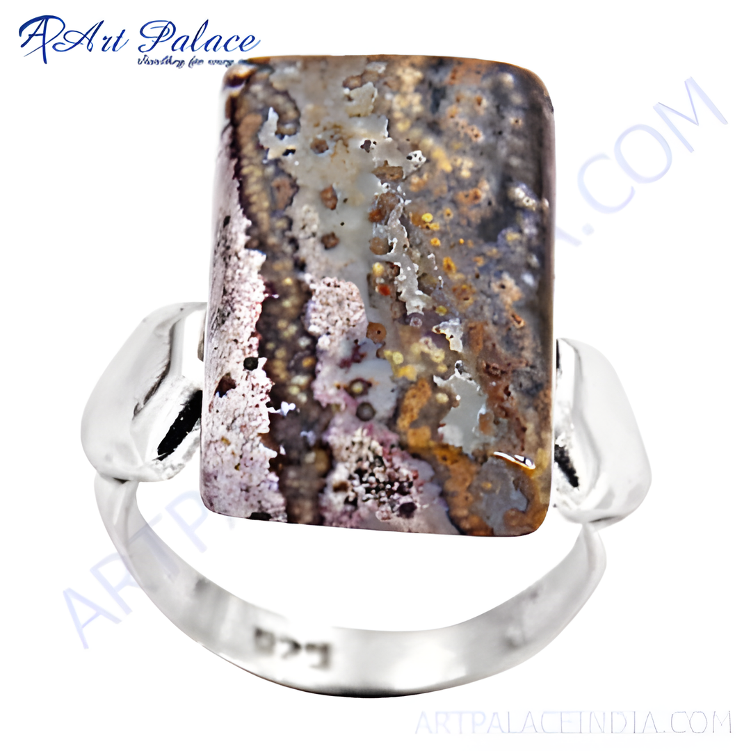 Sterling silver gemstone ring with a rectangular natural stone in earthy tones.