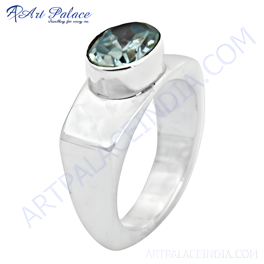 Sterling silver ring with a large blue oval gemstone, perfect for women's fashion and statement jewelry.