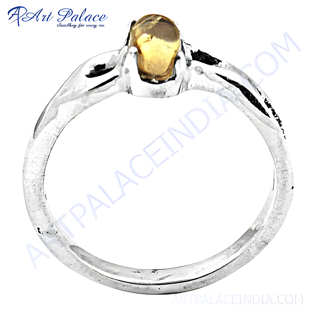 925 sterling silver ring with a golden yellow citrine gemstone. Elegant and classic design.