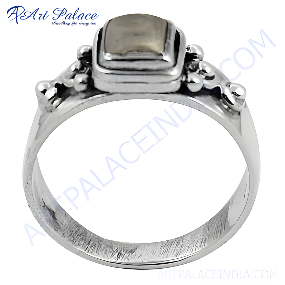 Sterling silver gemstone ring for women, featuring a square-shaped, light-colored gemstone. The ring is showcased on a white background, highlighting its details.