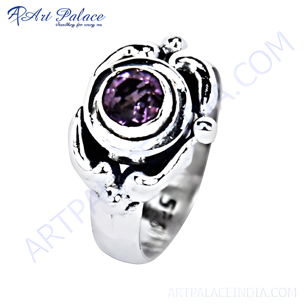 Sterling silver ring with a large round purple amethyst gemstone set in a unique design