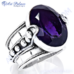 Load image into Gallery viewer, Sterling silver ring with a large oval-cut purple amethyst gemstone.
