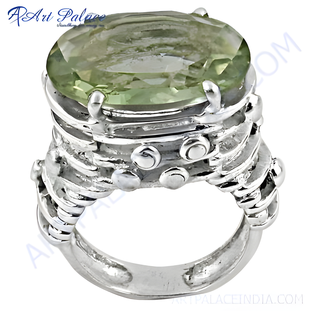Sterling silver ring with a large oval-cut green amethyst gemstone, a beautiful green color in a striking design.