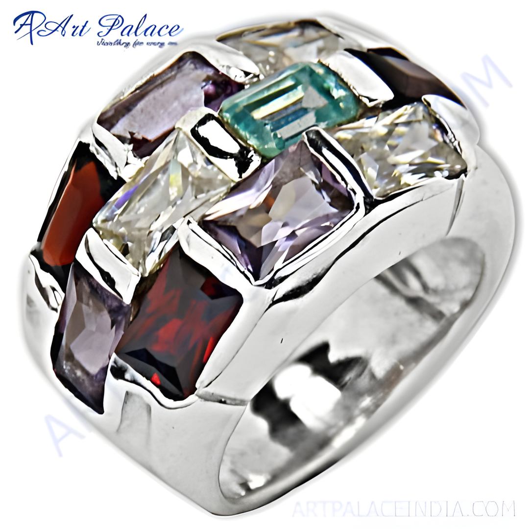 Silver statement ring featuring a mosaic of colorful gemstones including purple, red, white, and green stones.
