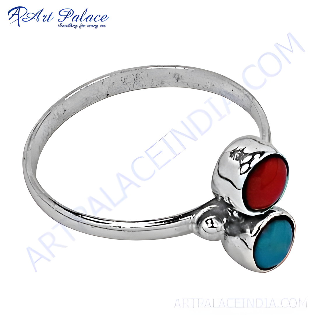 925 sterling silver ring with red and blue gemstones, a vibrant and stylish piece of jewelry.