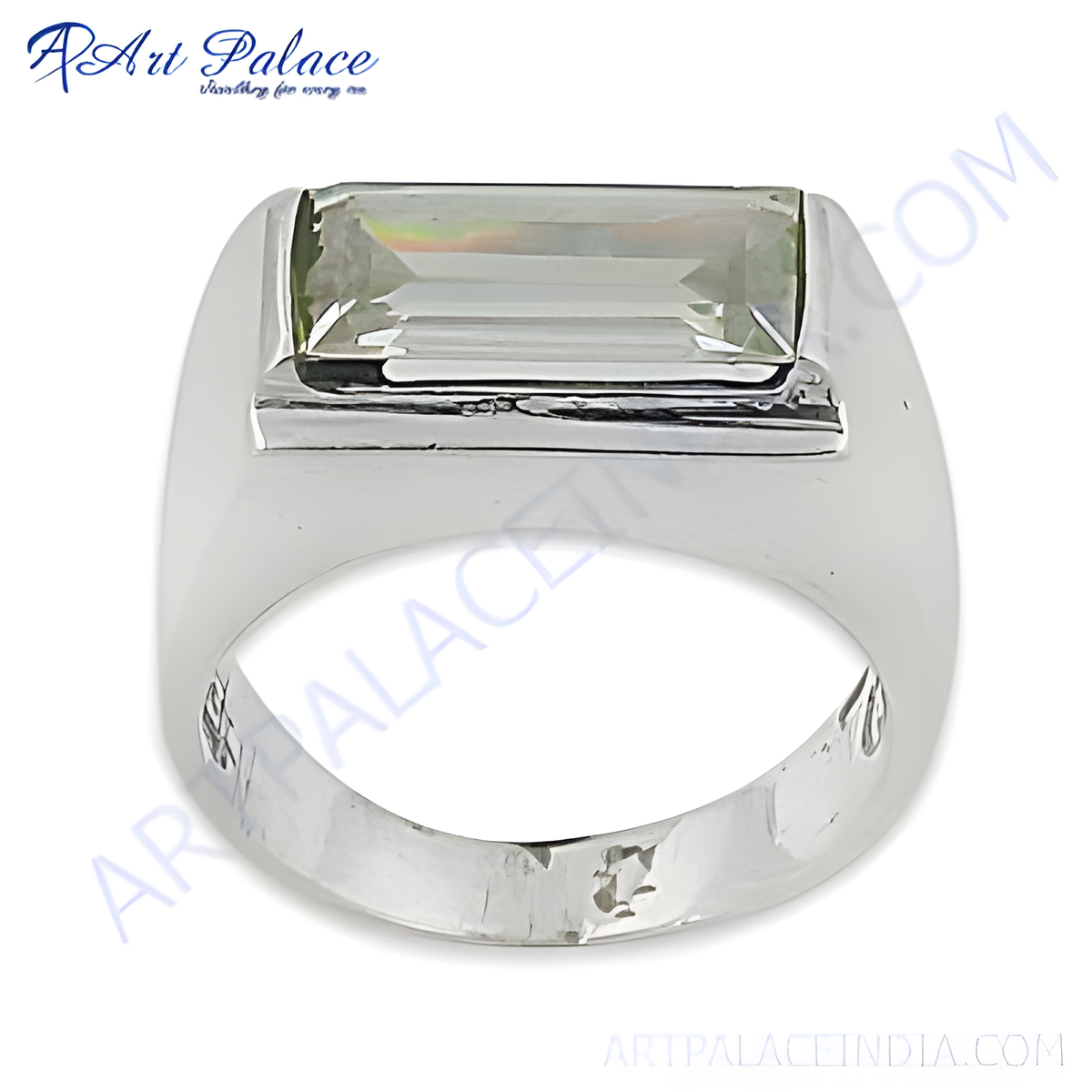 Silver signet ring with a large rectangular emerald cut gemstone in a bezel setting