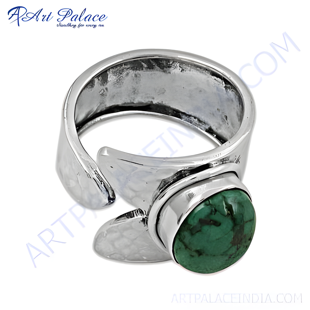 Sterling silver ring with a large green turquoise gemstone, perfect for statement jewelry.
