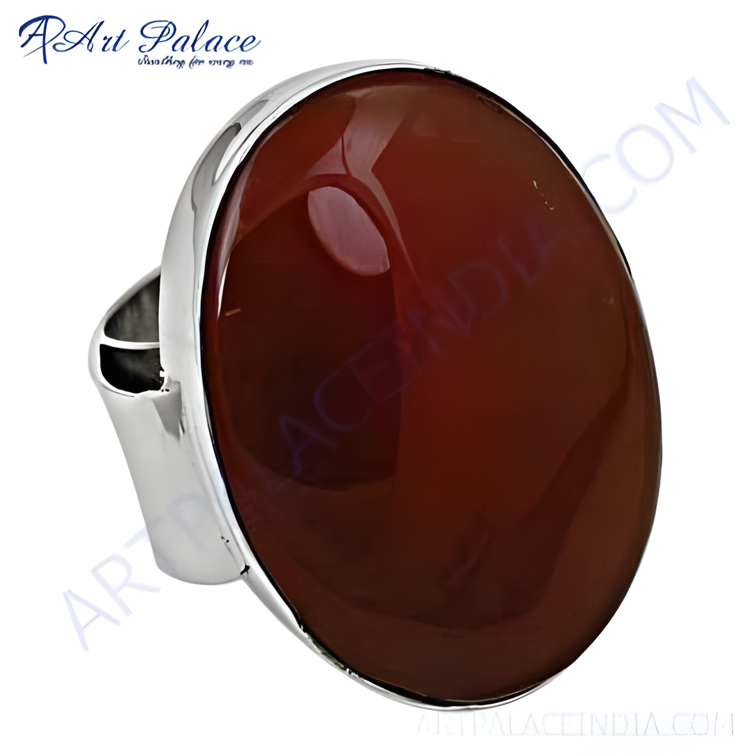 Oval carnelian gemstone set in a polished silver statement ring for women.