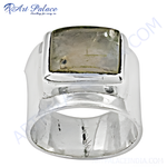 将图像加载到图库查看器中， Sterling silver ring with a rectangular gemstone set in a wide band design. The ring is highly polished and eye-catching.
